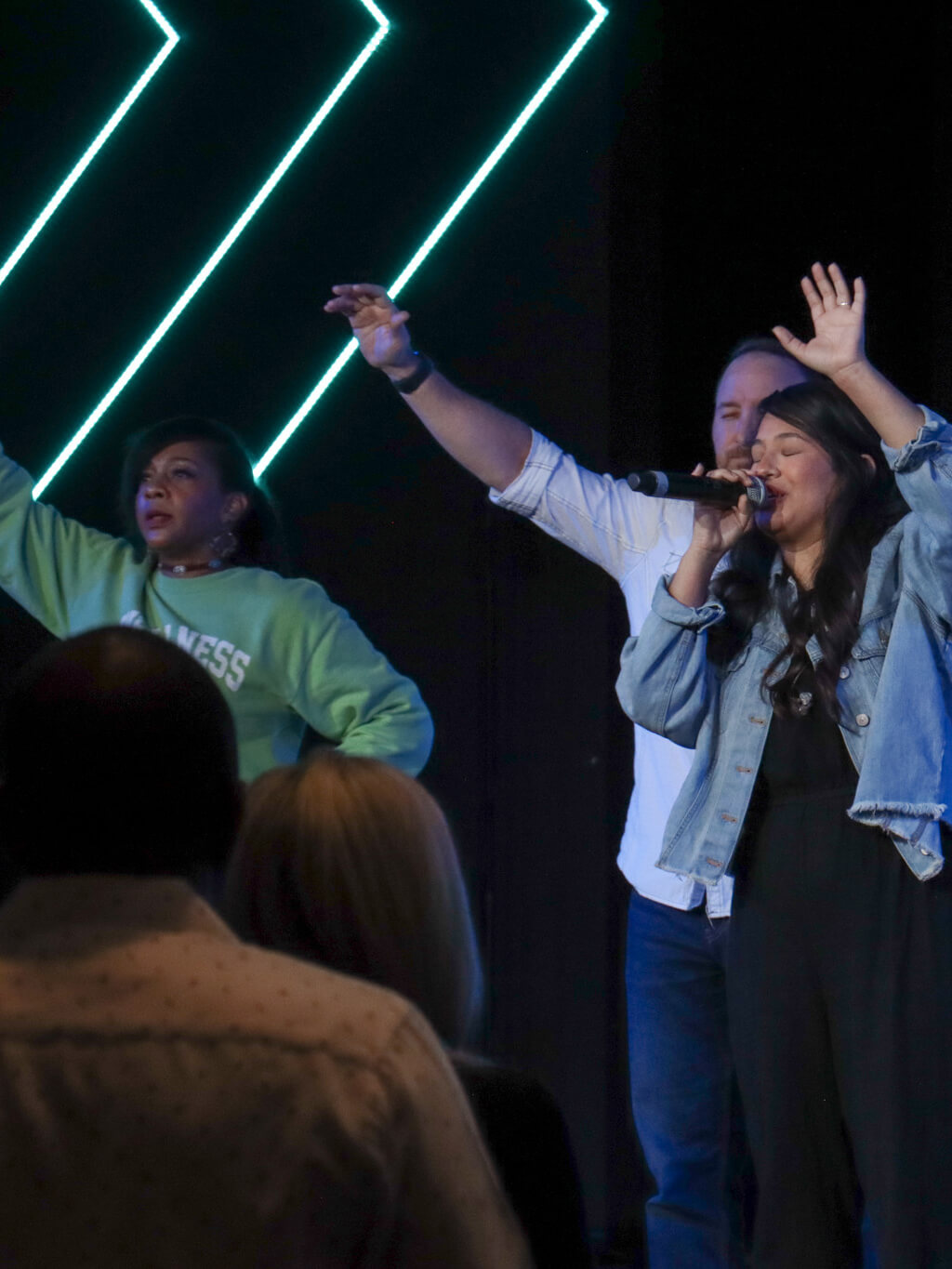 woman raising hands